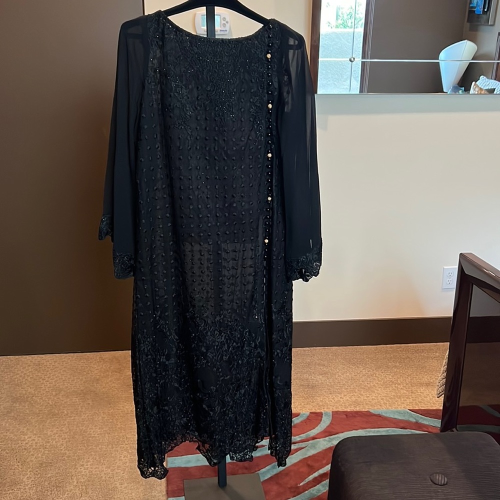 Pure chiffon fully embroidered fabric enhanced with black stones long shirt